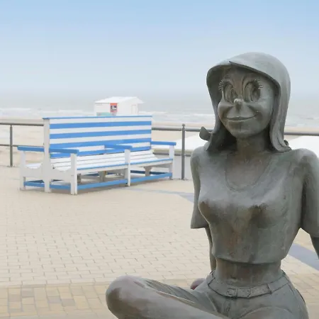 With Terrace On The Seafront Promenade